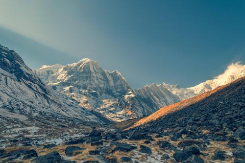 Sun on the left, cloud on the right. ABC trek, Himalayas, Nepal.