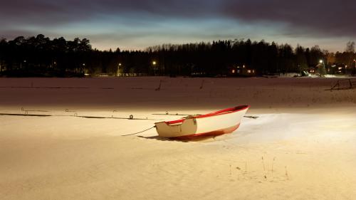Boat stuck in snow during winter, night landscape HQ