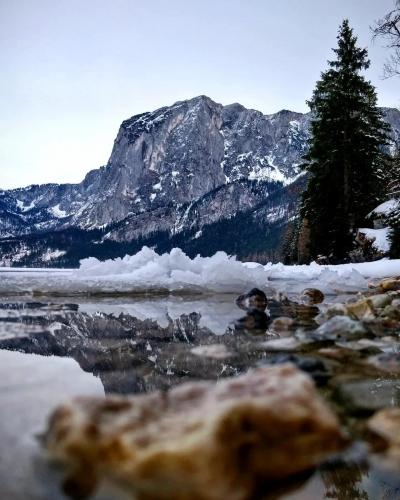 Frozen Lake at the foot of a mountain, Altaussee, Austria