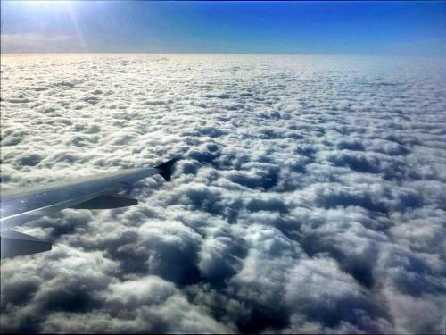 Sea of puffy clouds tops somewhere over the mid west.