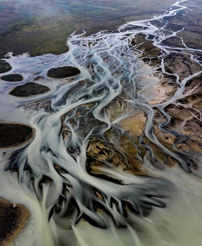 Bird’s eye view of a glacial river in Iceland creating a surreal looking landscape  - more of my abstract landscapes at IG: @glacionaut