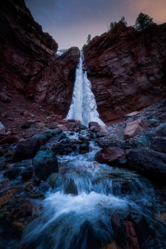 The changing of the seasons in the mountains. Waterfall near Telluride, Colorado, USA