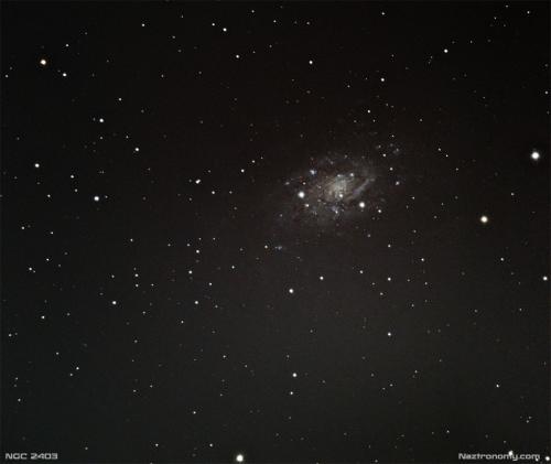 NGC 2403 - Pushing the limits of my unmodded DSLR under Bortle 7