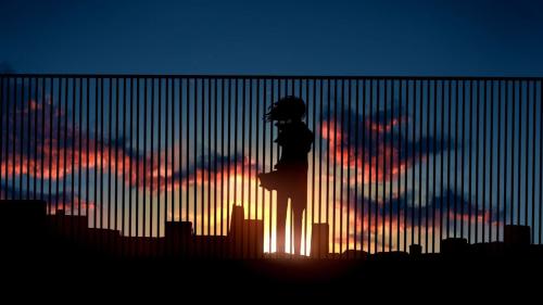 A girl in the background of the setting sun