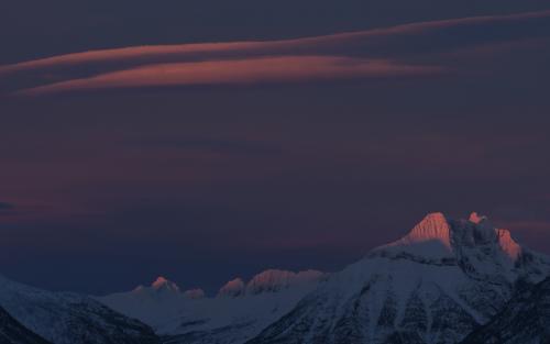 Alpenglow and Lenticular Clouds over Lake Macdonald, Glacier National Park, MT.  @seanaimages
