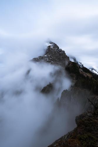 Canada Border Peak shrouded in clouds, BC Canada