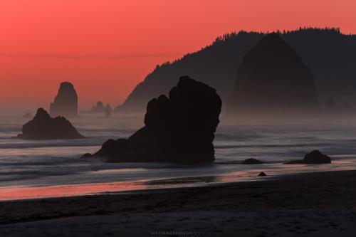 Red dawn on Cannon Beach, Oregon
