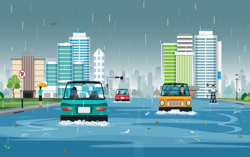 Cars are running on flooded streets in the city