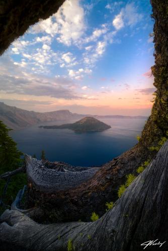 Found a dead tree...used it for a frame. "Crater in the Woods" - Crater Lake National Park @JeremyVeselyPhotography