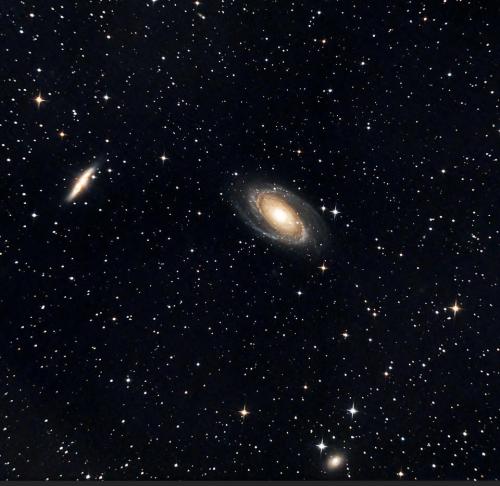 Meet Bode galaxies M81 and M82 in the constellation Ursa Major. Greetings from 12 million light-years away. At the bottom is a small Garland galaxy.