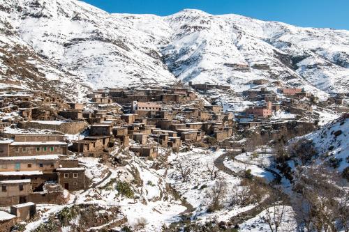 Snowy Berber Village In The Atlas Mountains, Morocco