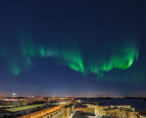 Aurora Borealis known as Northern Lights. Helsinki Finland