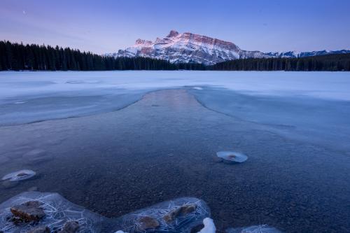 A chilly sunrise over Mount Rundle, Alberta.