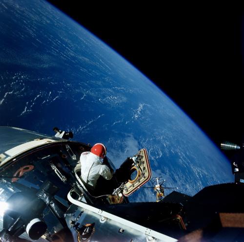 Dave Scott enjoys the view from the open hatch of the Apollo 9 command module, March 6, 1969.