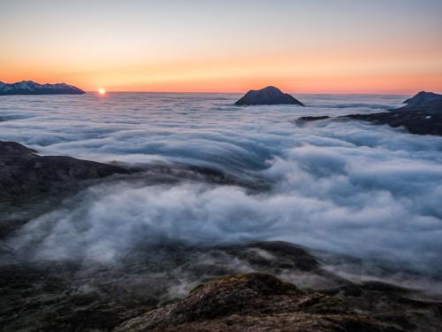 Aleutian Islands, Alaska, Watching The Clouds Flow Between the Mountains ,