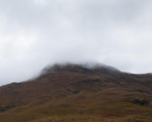 Fog rolling over the mountains in the Isle of Skye, Scotland