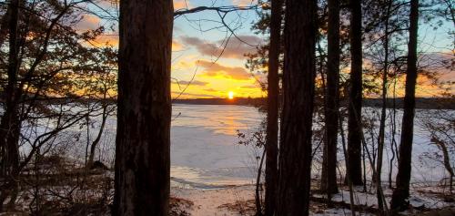 Winter sunset over frozen lake  Akron Ohio