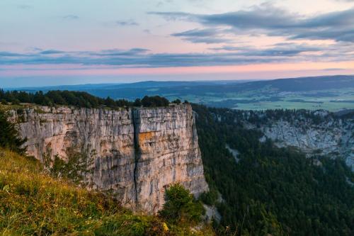 Evening sun Red light of Creux du van