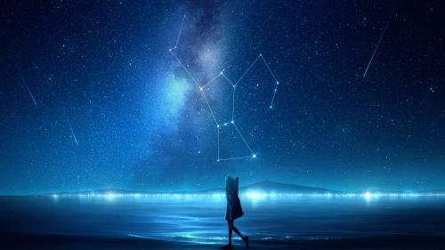 Girl on the shore under the starry sky