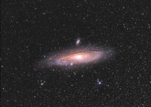 Every second you are not running, its getting closer!  Andromeda galaxy through my telescope in dark skies park. OC