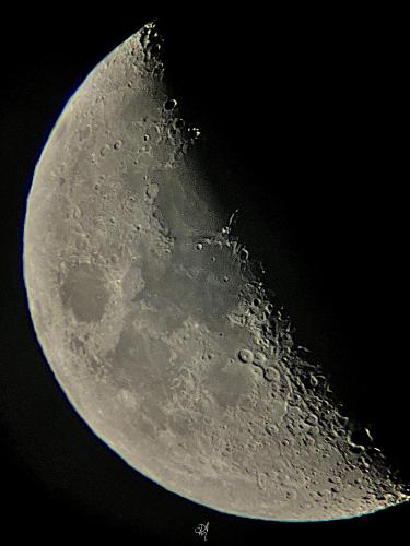  A sharpened and enhanced image of Earth's moon, Luna, snapped through an Astromaster 70AZ + with iPhone 12 Pro