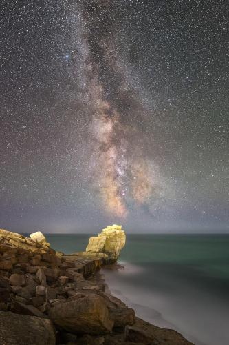 Pulpit Rock on the island of Portland, Dorset  is a popular spot for astrophotography. Being on the southern tip of the island, there is no light pollution facing south between you and France...
