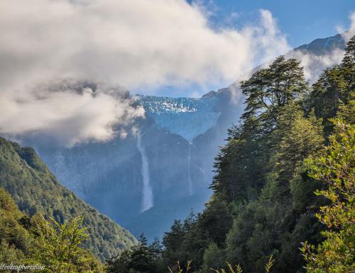 Ventisquero Colgante, the hanging glacier of Queulat National Park in Chile. OC [2048 x 1577]