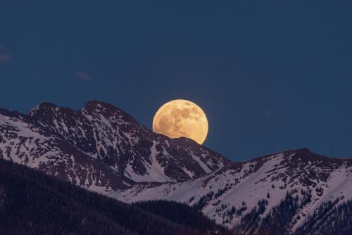 The moon rising over the Rockies