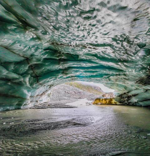 Icecave in Switzerland 🇨🇭 in summer. Looking out of a glacier mouth. ; more of my glacier fotos IG @glacionaut