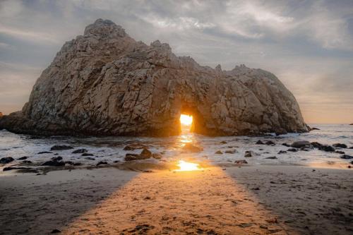 Let nature shine a beam of light for you at sunset pfeiffer beach, california