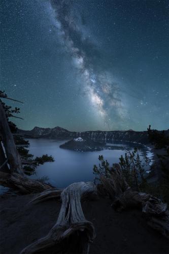 Milky Way galaxy rising above Crater Lake, Oregon