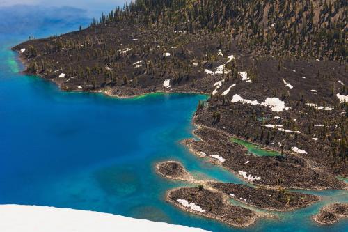 Wizard island and the blue water of Crater Lake looks like a tropical island when viewed from above, Oregon