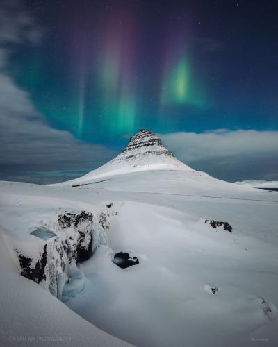 Aurora dancing over Kirkjufell, Iceland last night  []