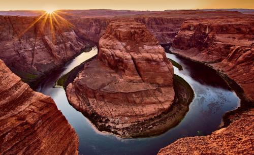 Sun setting behind Horseshoe Bend, AZ