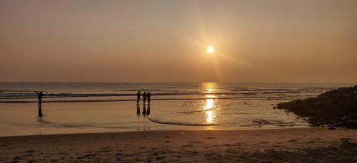 A serene sunrise at Promenade Beach in Pondicherry, India