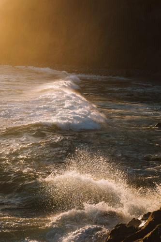 Some glowing light on crashing waves, Dana Point, CA