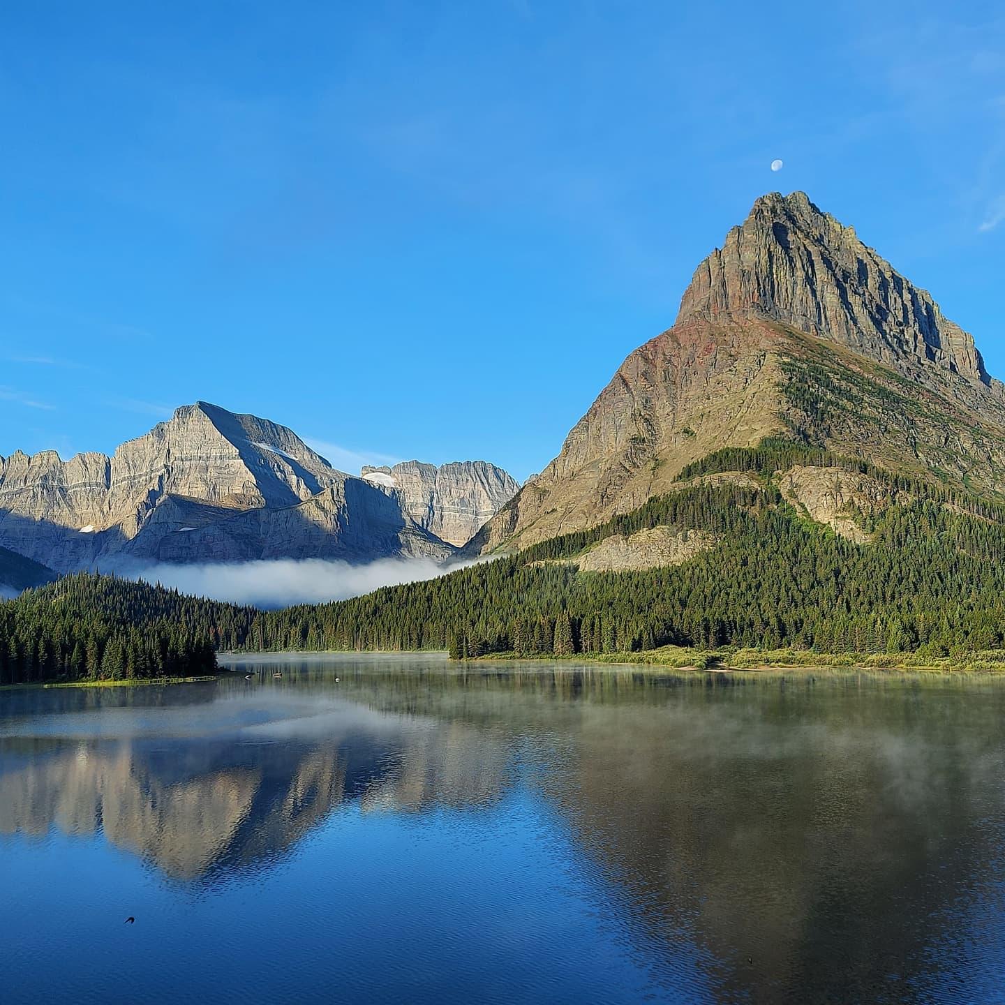 Swiftcurrent Lake, Glacier National Park -- Moon Visible Morning as the Clouds Roll In .